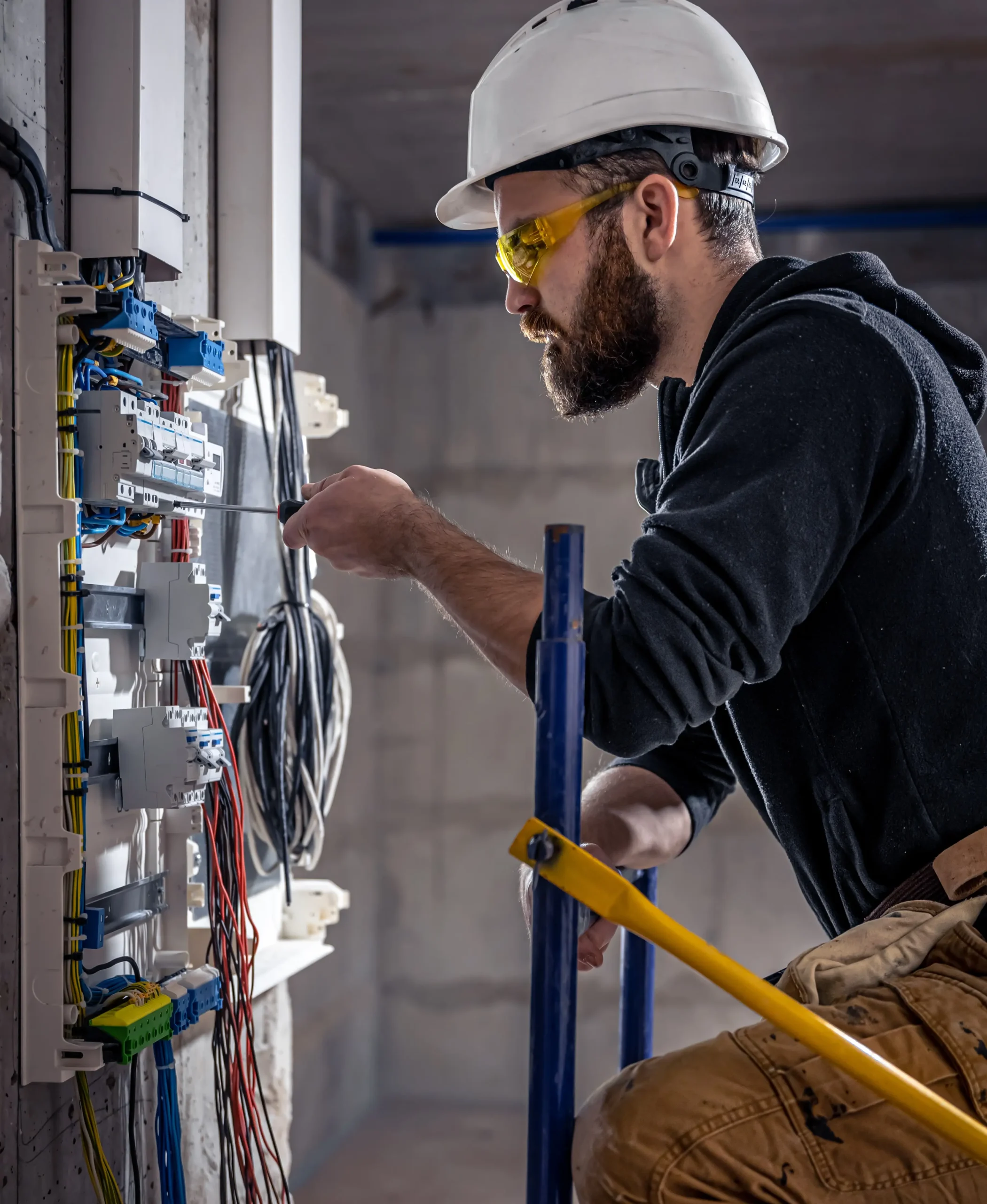 Licensed electrician diagnosing electrical fault
