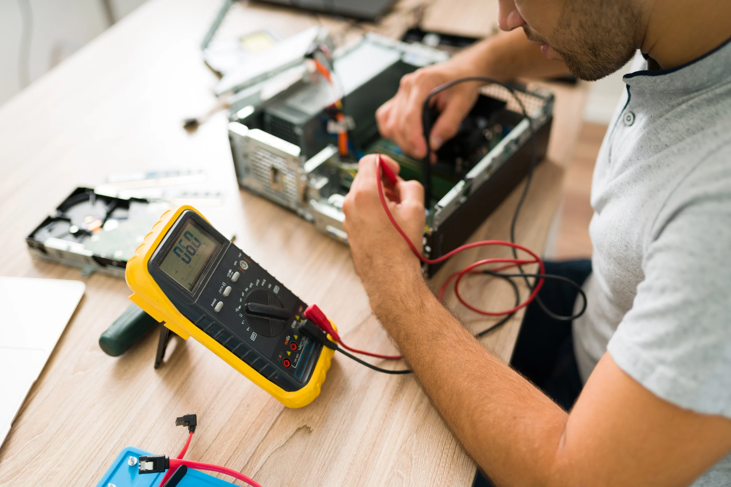 Licensed electrician performing electrical panel testing